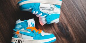 Overrated baby shoes kicked off by an Irish baby, illustrating why pre-walker shoes are often a waste of money.